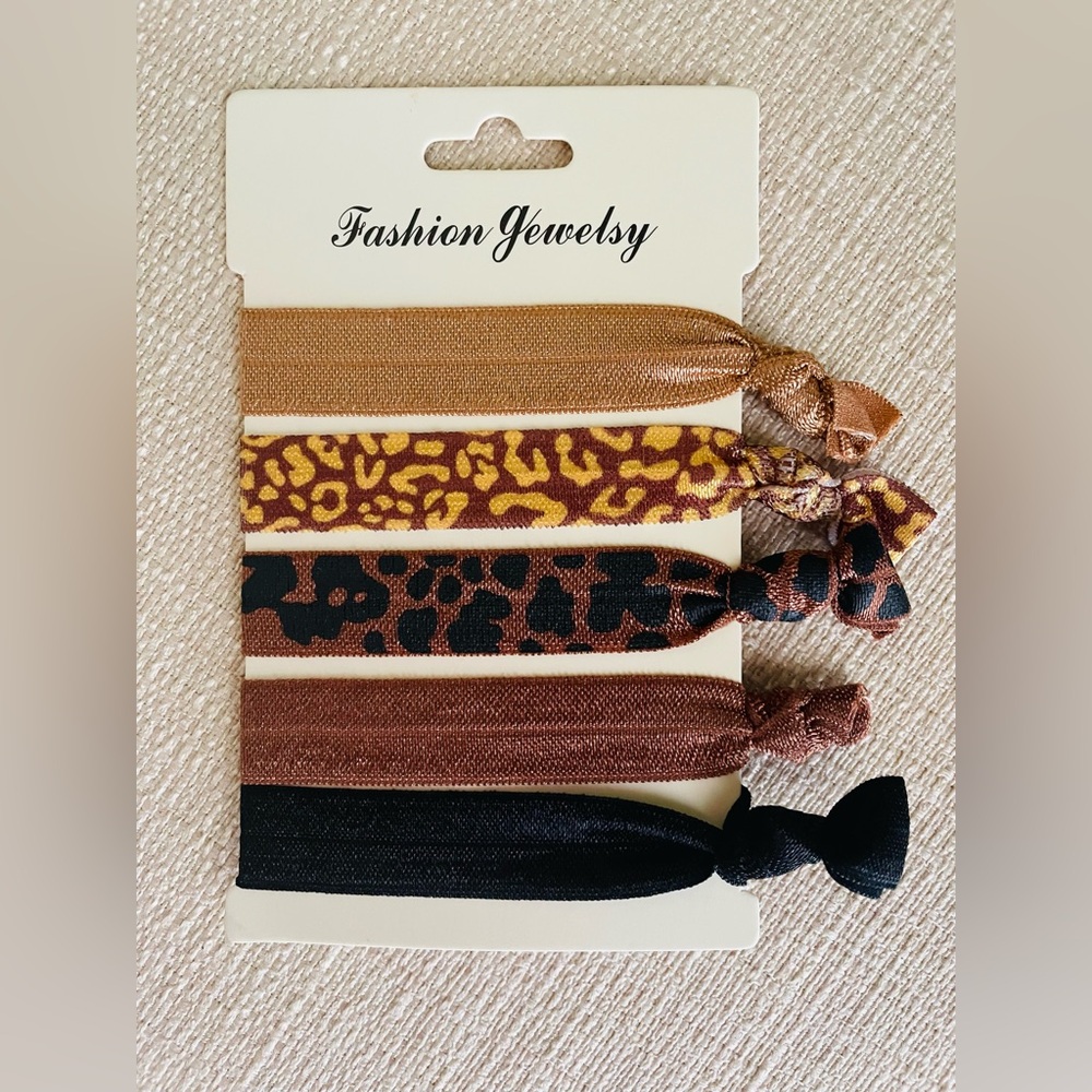 New Hair Ties or Bracelets. Multiple colors. 5 total pieces.